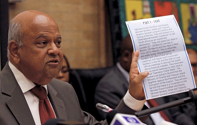 Former Finance Minister Pravin Gordhan shows the Media the fake 'Intelligence Report'