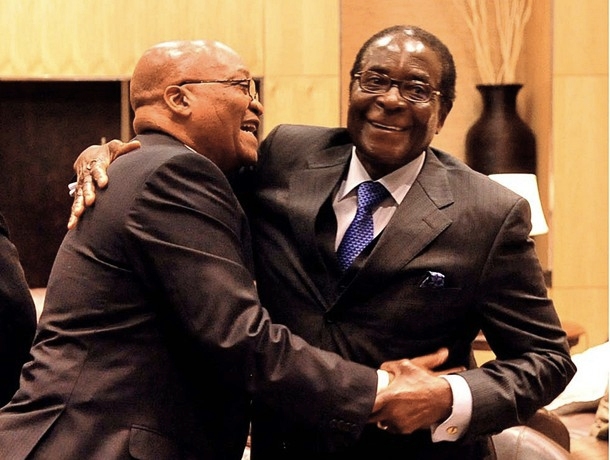 Jacob Zuma hugging Robert Mugabe